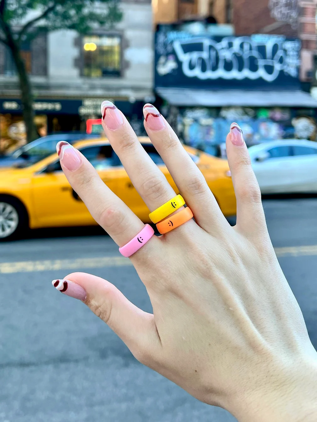 Flip Reversible smile / frown ring neon orange - Image 5